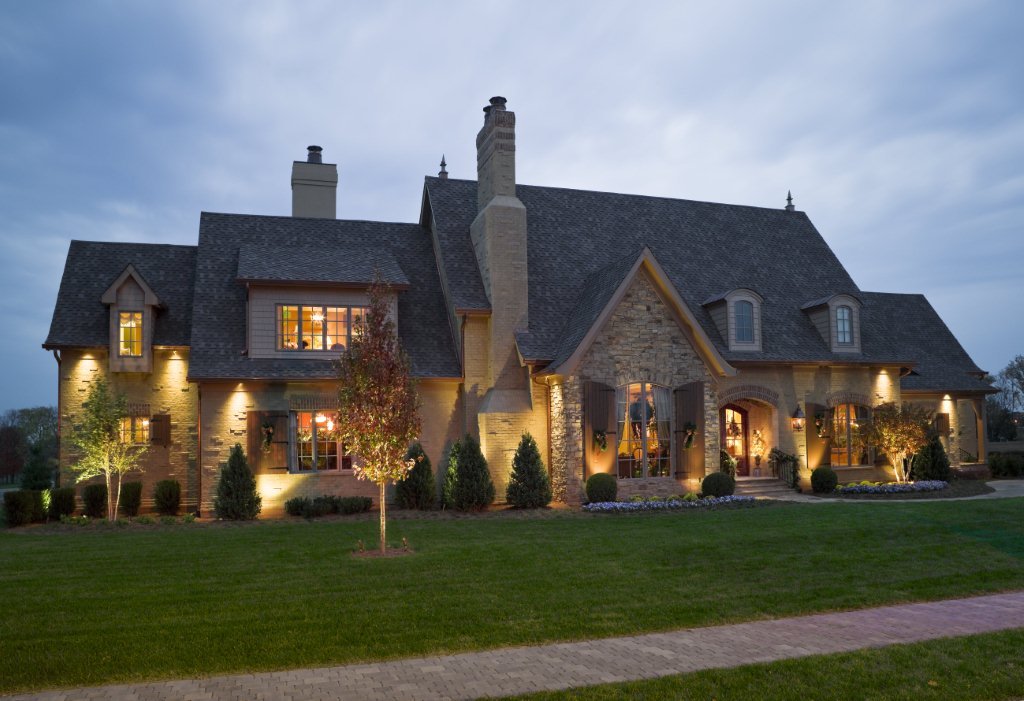 Most popular Pinterest pin to date is the exterior of this Hughes-Edwards home in Hendersonville, TN, part of the 2012 Charity Tour of Homes, with dreamy landscape lighting. 
